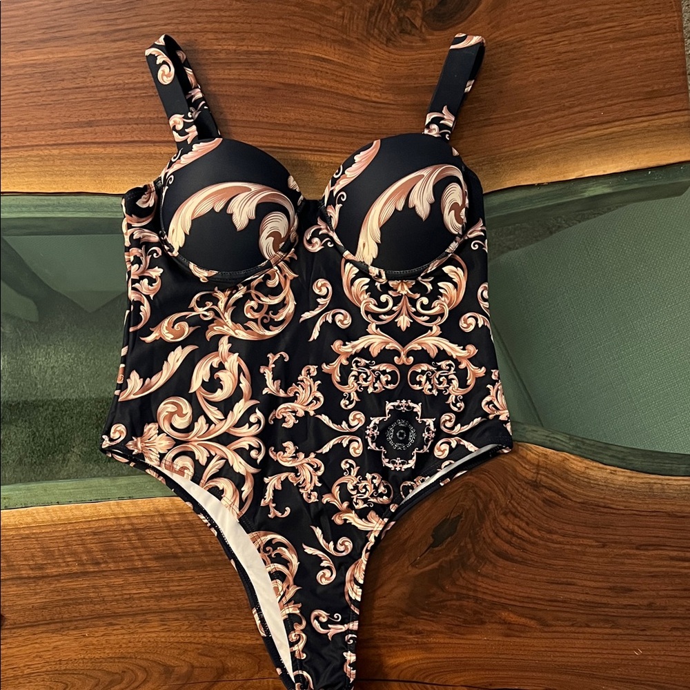 Women’s Black One-Piece Swimsuit with Gold Scroll Print and Support.